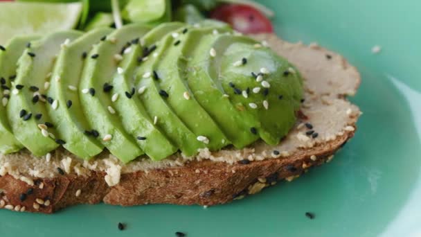 Healthy Avocado Toast Salad Plate Sesame Flax Seeds Vegetarian Food — Videoclip de stoc