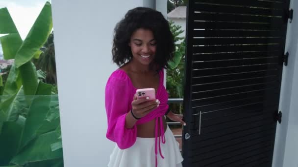 Slow Motion Happy Young Woman Using Smartphone Communicating Online While — Vídeo de Stock