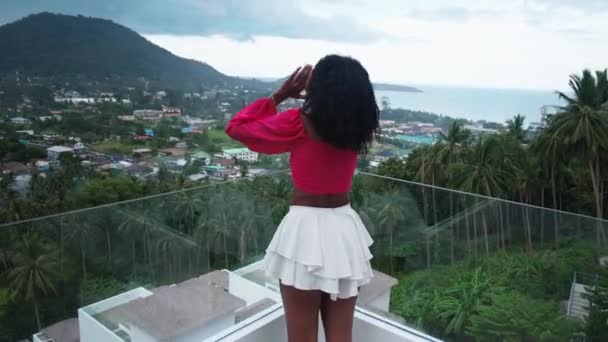 Steadicam Shot African Woman Balcony Enjoying Amazing View Tropical Asian — Wideo stockowe