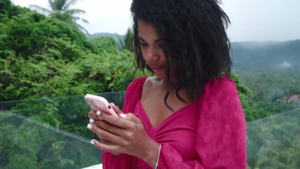 Beautiful Woman Using Mobile Phone Checks Content Social Network Balcony — Stock videók