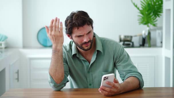 Frustrated Guy Using Smartphone Feeling Dissatisfied Incorrect Slow Software Work — Stock Video