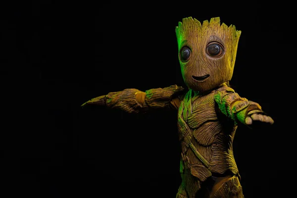 Marvel comic character Groot costume on a black background