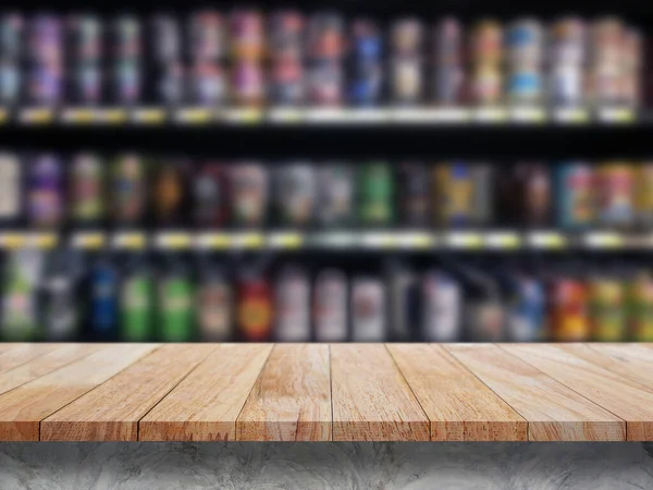 Empty wooden bar counter with defocused background and bottles of restaurant, bar or cafeteria background /for your product display