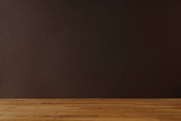 Dark grey background for copy space and wooden table