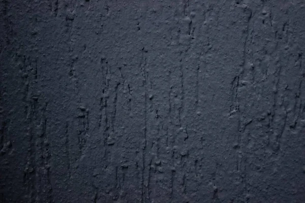 Parede texturizada cinzenta, bordas escuras. Parede texturizada cinza, gesso decorativo. fachada da casa — Fotografia de Stock