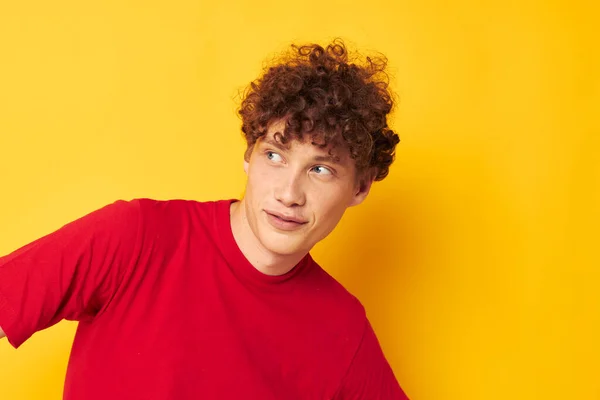 Guy with red curly hair summer style fashion posing yellow background unaltered — Stockfoto