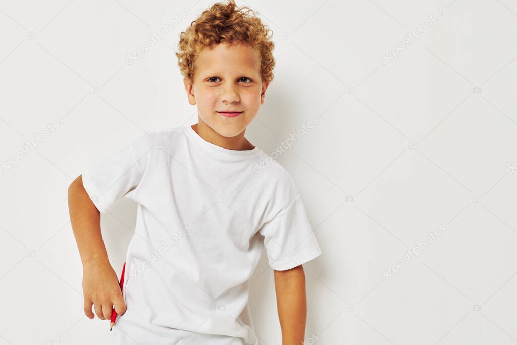 boy with white hair angry facial expression resentment light background