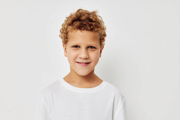 Cute little boy smile in white t-shirt childhood unaltered