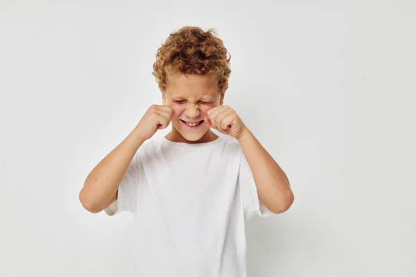 Cute little boy in a white t-shirt posing fun Lifestyle unaltered — Foto Stock