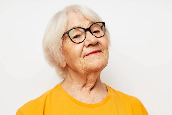 Emotional elderly woman health lifestyle eyeglasses treatment close-up — Stock Photo, Image