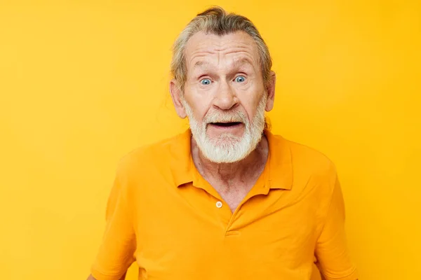 Portrait elderly man with a gray beard emotion gestures hands cropped view — Stock Photo, Image