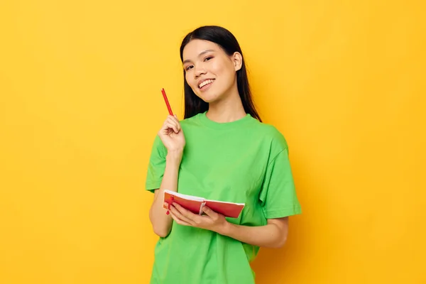 Portrait Asian beautiful young woman notebook and pen learning education studio model unaltered — Stock Photo, Image