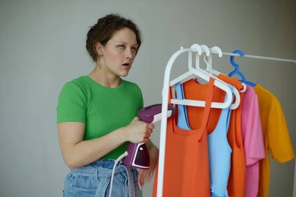 Beautiful woman trying on clothes wardrobe Youth style cropped view unaltered — Stock Photo, Image