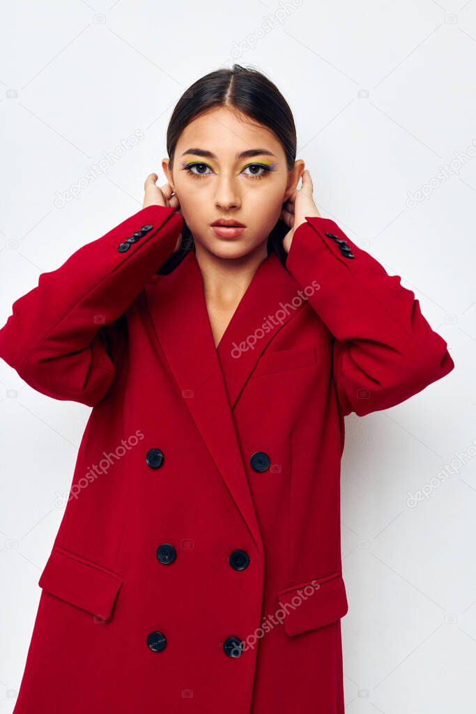 young woman in a red jacket cosmetics smile Lifestyle unaltered