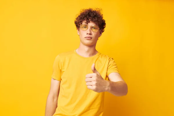 Young curly-haired man Youth style glasses studio casual wear Lifestyle unaltered — Stock fotografie