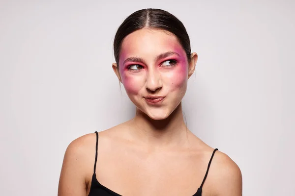Pretty woman pink face makeup posing attractive look light background unaltered — Stock Photo, Image