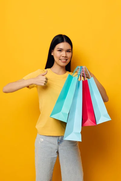 Portrait Asian beautiful young woman fashion shopping posing isolated background unaltered — Stockfoto