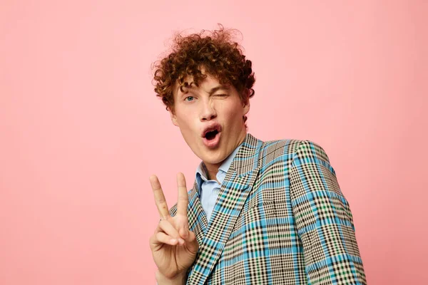 Portrait of a young curly man checkered blazer elegant style posing fashion Lifestyle unaltered — Stock Fotó