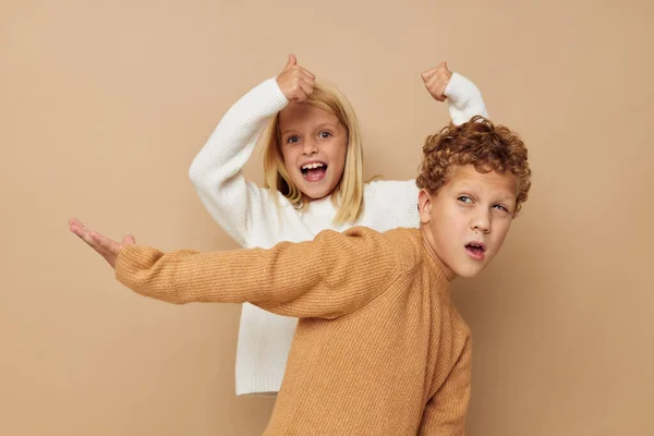 Little boy and girl hug entertainment posing friendship childhood unaltered — Stock Photo, Image