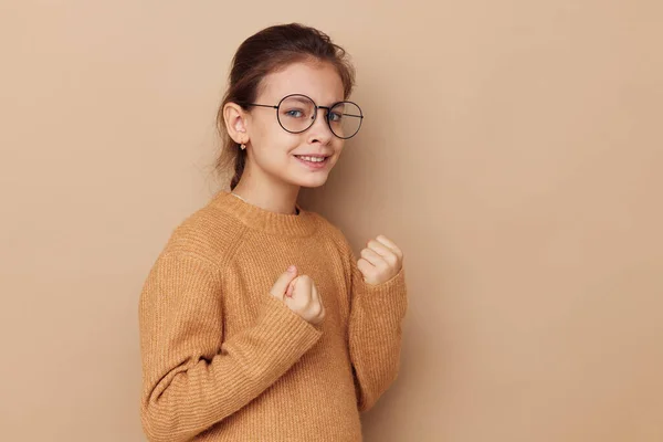 Little girl with glasses emotions gesture hands isolated background — Stock Photo, Image