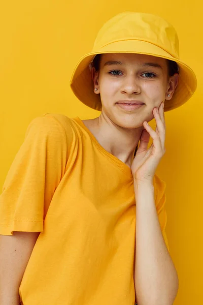 Young woman in a yellow hat Youth style casual wear isolated background — Stock Photo, Image