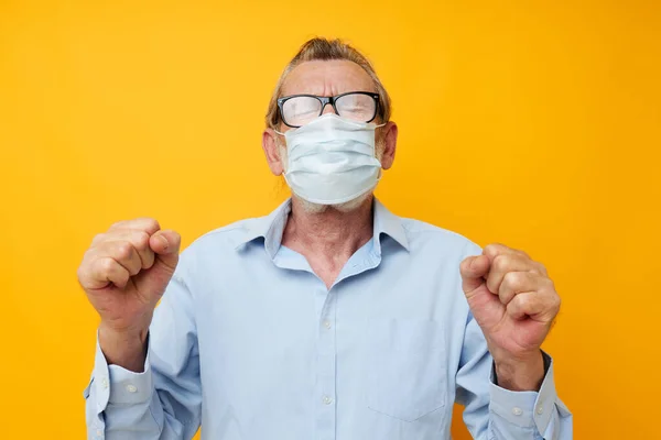 Old man with glasses safety medical mask posing isolated background — Stock Photo, Image