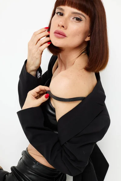 Beautiful woman attractive glance posing black jacket fashion isolated background — Stockfoto