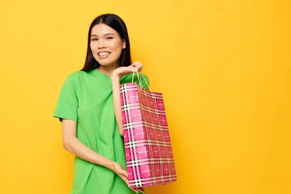 Woman entertainment shopping package isolated background unaltered — Stock Photo, Image