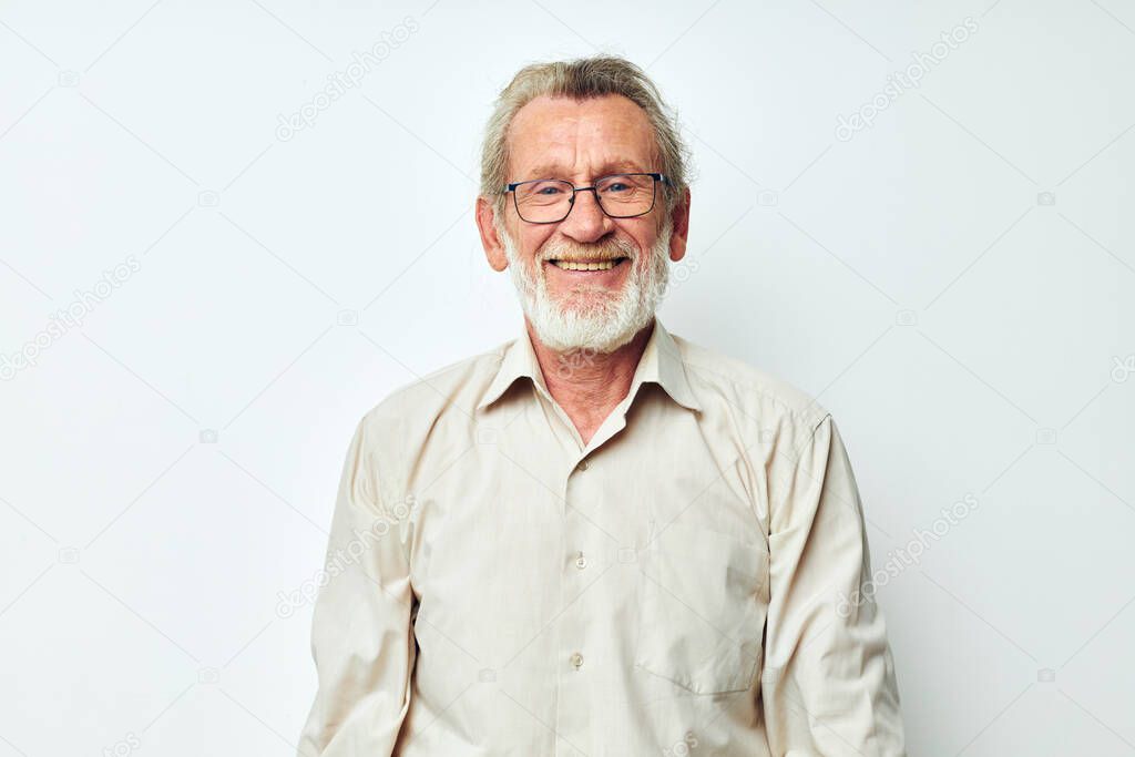 Portrait elderly man wears glasses in shirts isolated background