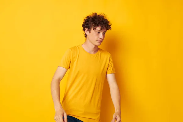 Young curly-haired man Youth style studio casual wear isolated background unaltered — Stock Photo, Image