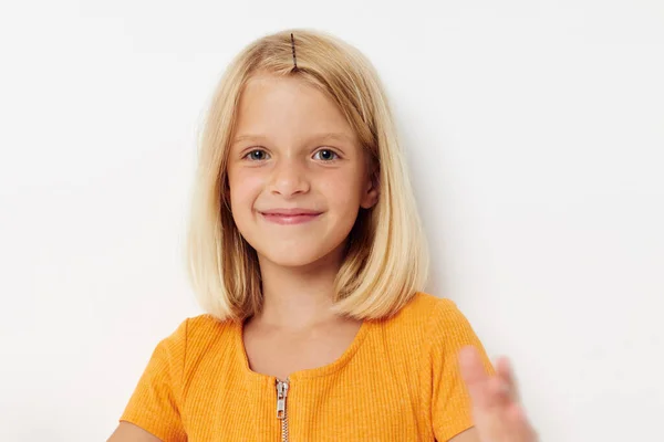 Cute little girl with blond hair basing fun childhood — Stock Photo, Image