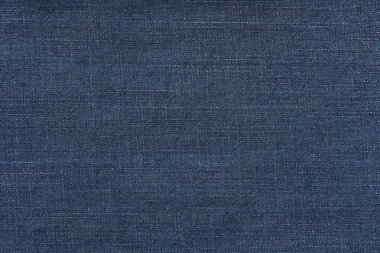Koyu mavi kot kumaşı. Denim kumaş arkaplanı.