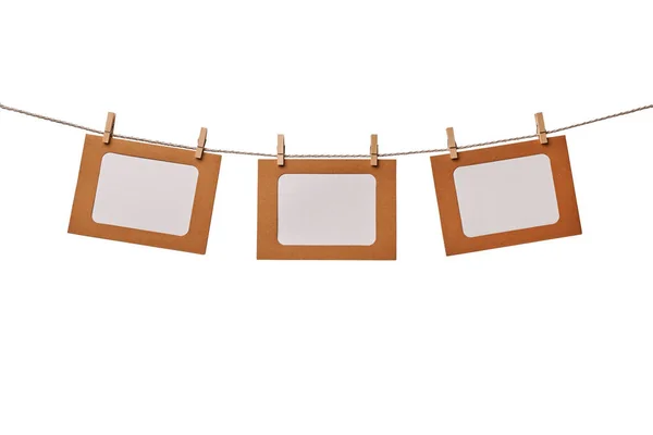 Three Craft Paper Photo Frames Hanging Rope Wooden Clothespins Isolated Royalty Free Stock Images