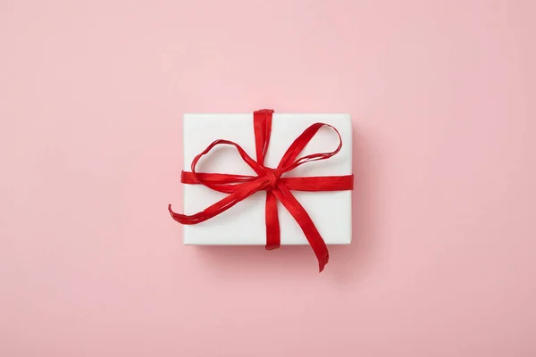 One Gift Box Wrapped White Paper Decorated Red Ribbon Pink Royalty Free Stock Photos
