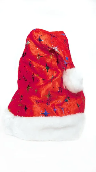 Beyaz arka planda güzel kırmızı Noel Baba şapkası