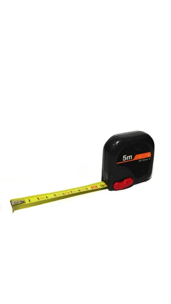 inşaat aracı mezurası beyaz arkaplan üzerinde siyah