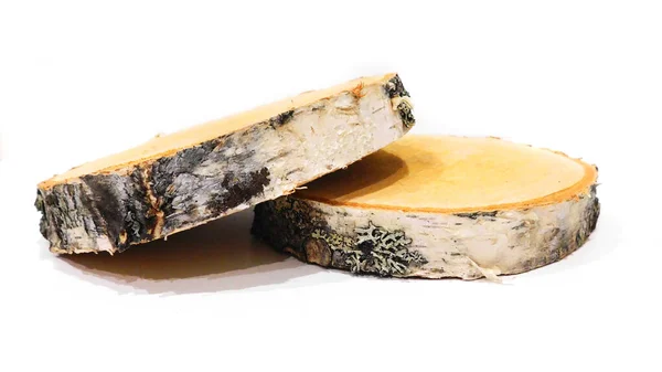 Tahta, beyaz arka planda daireler çiziyor.