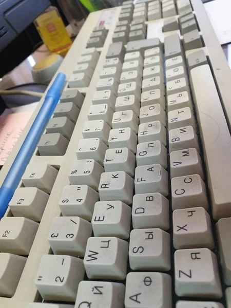 computer keyboard dirty working gray square top view