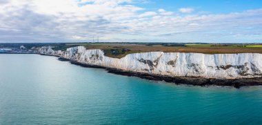 Aerial view of the White Cliffs of Dover. Close up view of the cliffs from the sea side. clipart