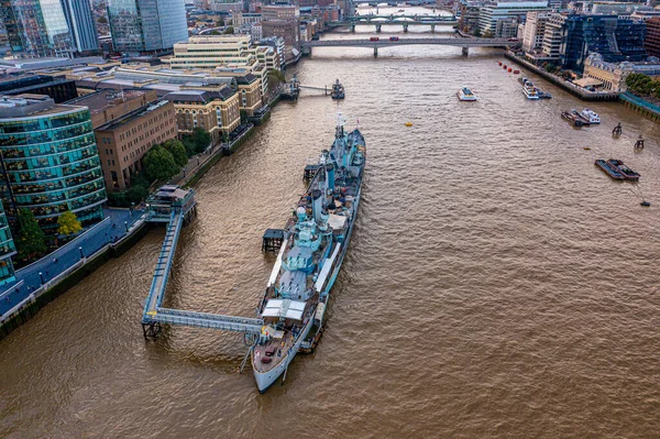 Aerial view of the war ship museum on the river Thames near the Tower bridge — Stock Photo, Image