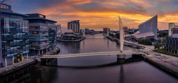 Aerial view of the Media City UK is on the banks of the Manchester at dusk — Stock Photo, Image