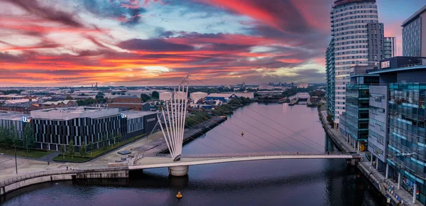 Aerial view of the Media City UK is on the banks of the Manchester at dusk — Stock Photo, Image