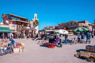 Local market stalls on city street selling handmade products