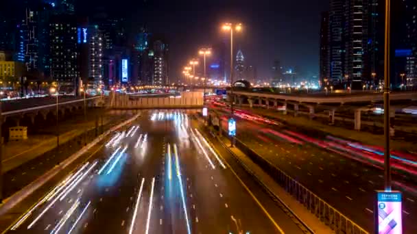 Long exposure of moving cars at night road in Dubai. — Stock Video