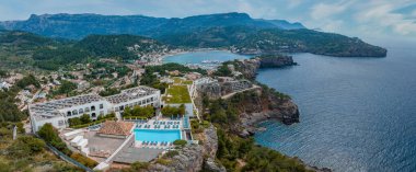 Aerial view of the luxury cliff house hotel on top of the cliff on the island of Mallorca, Spain.