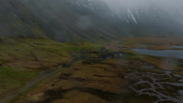 Aerial View Viking Village Stormy Rainy Day Stokksnes Vestrahorn Mountain — Stock Video