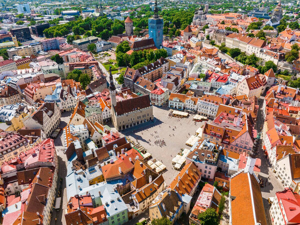 Aerial view of the sunny day during summer time in a beautiful medieval Town Hall Square in Tallinn old town, Estonia