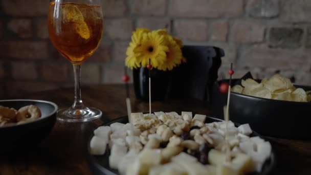 Traditional Italian Aperitif Cheese Nuts Aperol Spritz Drink Wooden Table — Stock Video