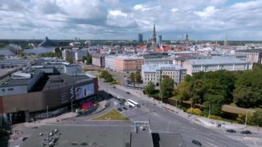 Aerial view of the Riga central train station tower with name of the city and clock. Riga title on top of the tower.