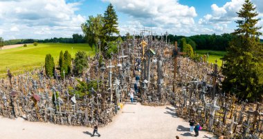 Aerial view of Hill of Crosses or KRYZIU KALNAS in Lithuania. It is a famous religious site of catholic pilgrimage in Lithuania